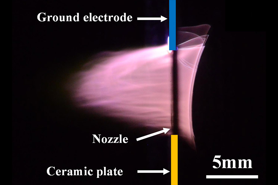 A low temperature air plasma jet based on a rotating electrode